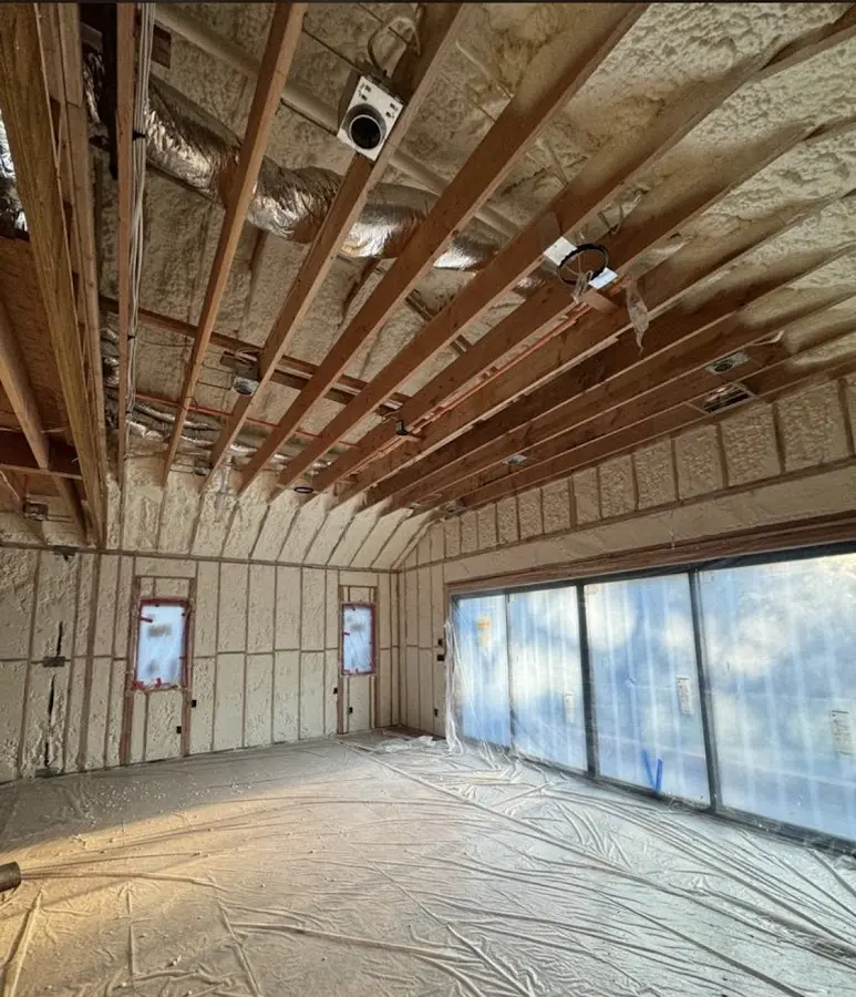 Interior walls and ceiling insulated with spray foam during new construction in Glen Ridge